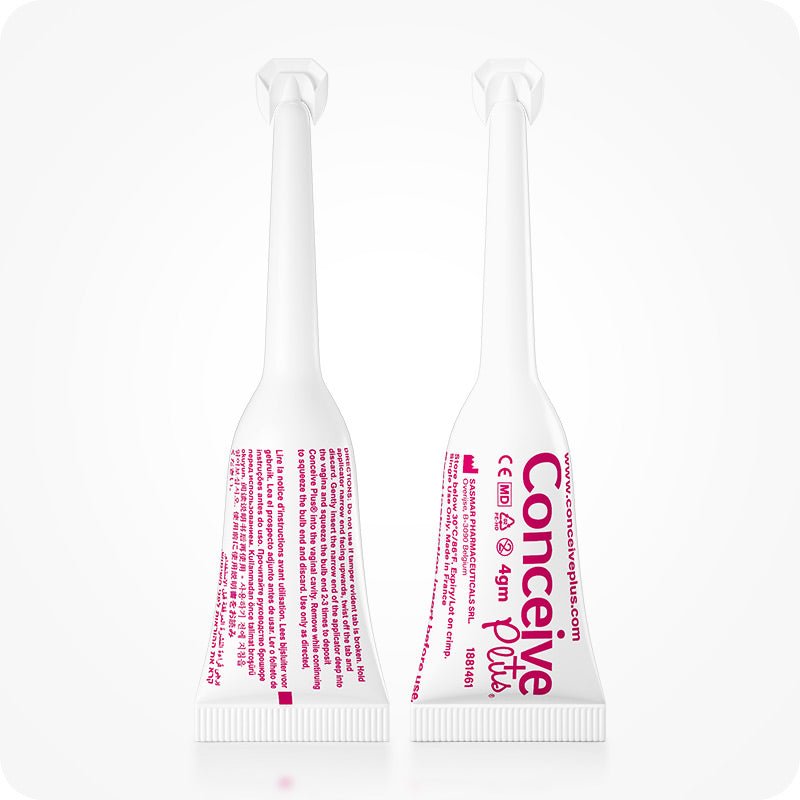 For Conceive Plus Fertility Lubricant Duo Bundle (75ml and 8 Applicators), close-up of two 4g pre-filled fertility lubricant applicators standing upright, one showing front label and other, back with usage directions, both designed for direct vaginal application to support conception.
