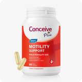 Conceive Plus Motility Support supplement bottle for men’s fertility, featuring a bold red and white label with words "Motility Support" visible, shown with two light-gold vegan capsules beside bottle, designed to support sperm motility, volume, and count with ingredients like CoQ10, Vitamin D, and Zinc.
